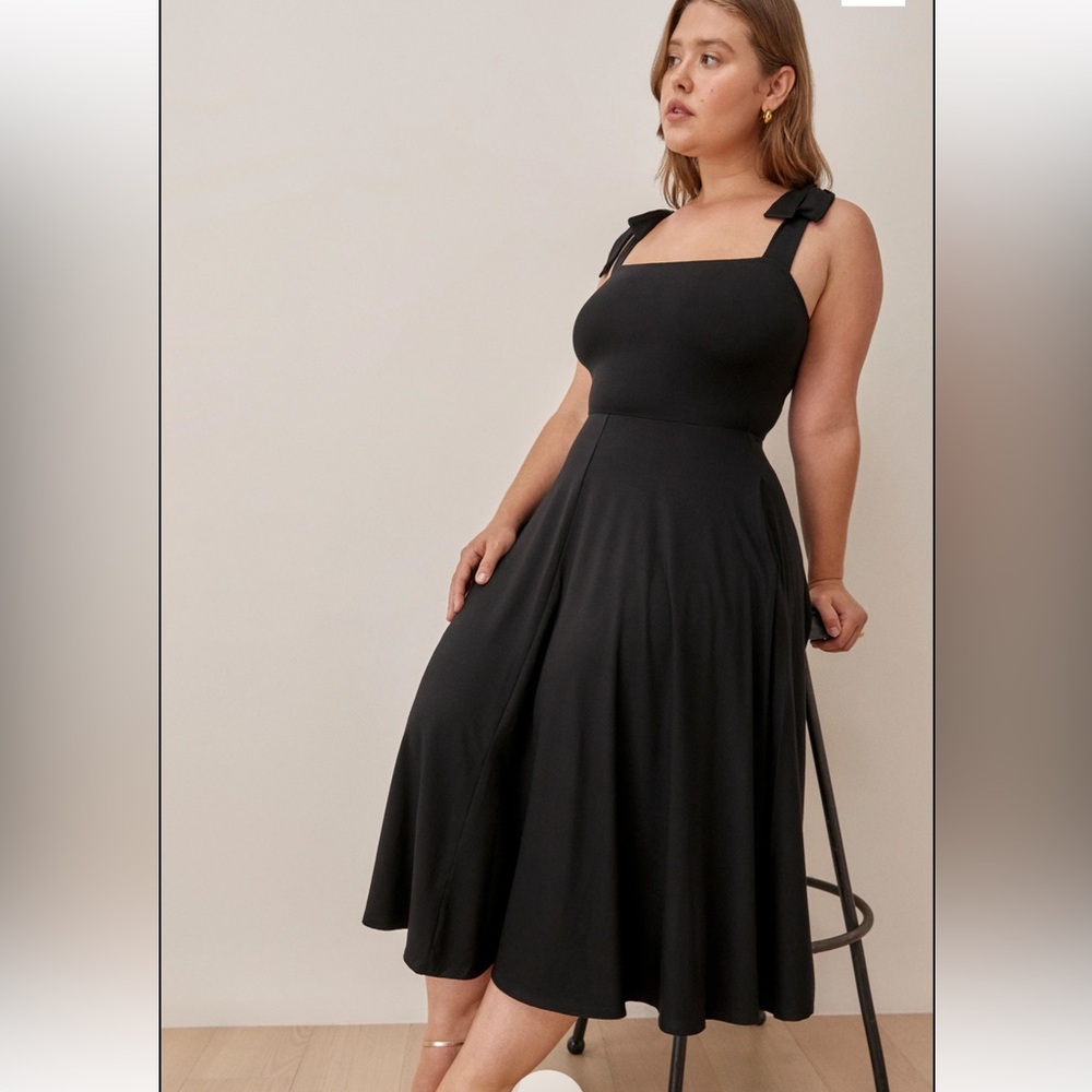 Black reformation dress with tie straps and pockets